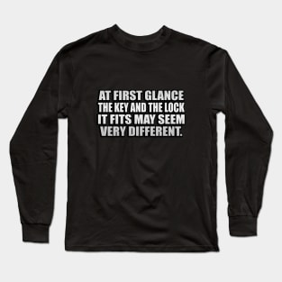 At first glance, the key and the lock it fits may seem very different Long Sleeve T-Shirt